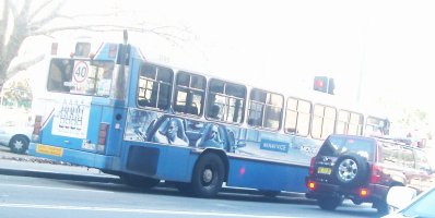 This bus is waiting at traffic lights